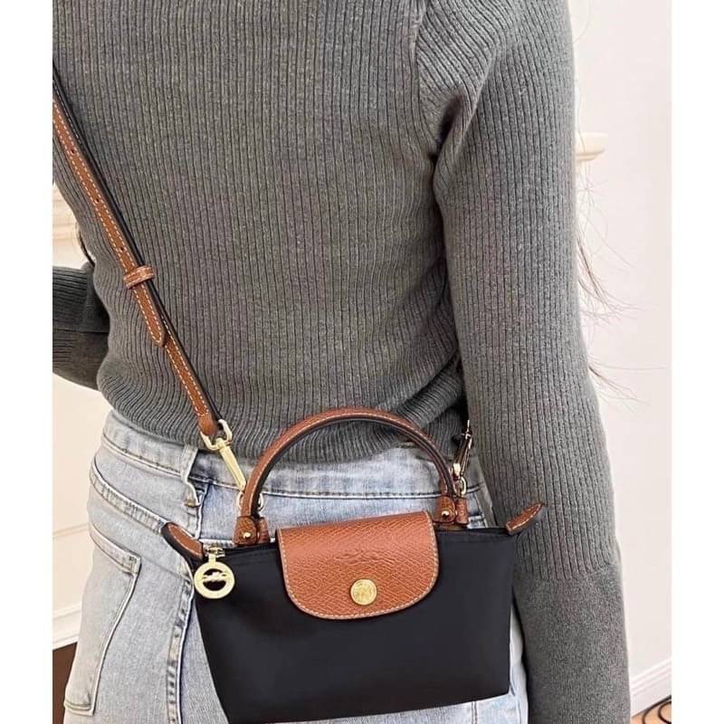 LONGCHAMP LE PLIAGE ORIGINAL Pouch with handle กระเป๋าใบเล็กขนาดกระทัดเหมาะกับใส่ของจำเป็นจุกจิก กันน้ำได้ พร้อมส่ง