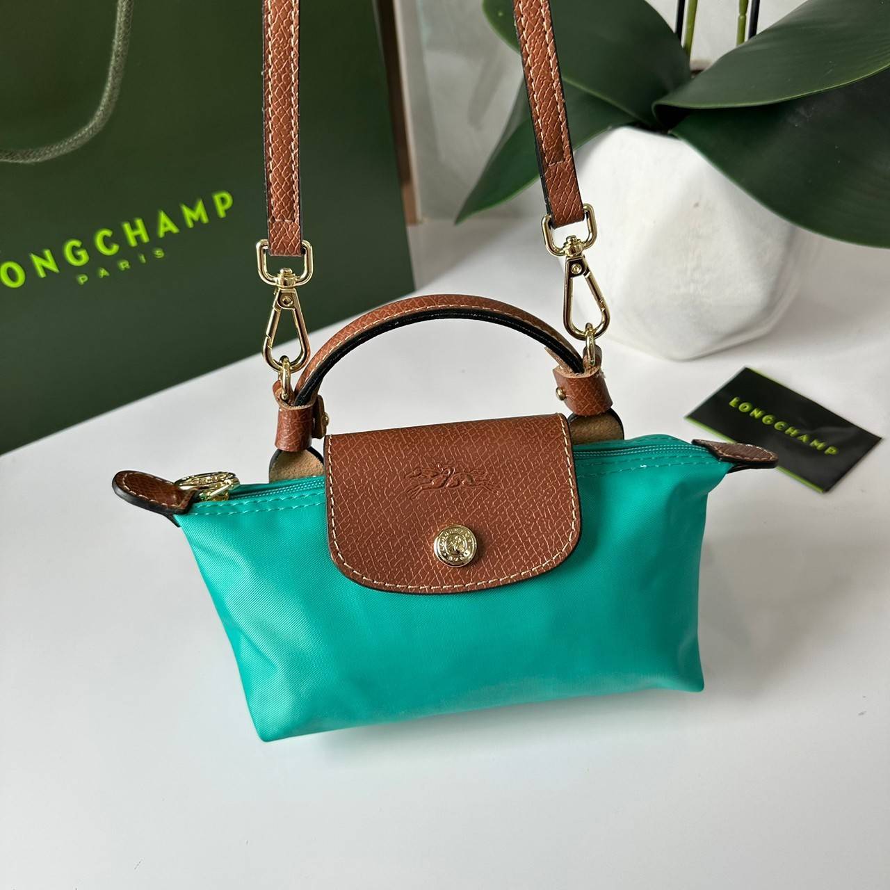 LONGCHAMP LE PLIAGE ORIGINAL Pouch with handle กระเป๋าใบเล็กขนาดกระทัดเหมาะกับใส่ของจำเป็นจุกจิก กันน้ำได้ พร้อมส่ง