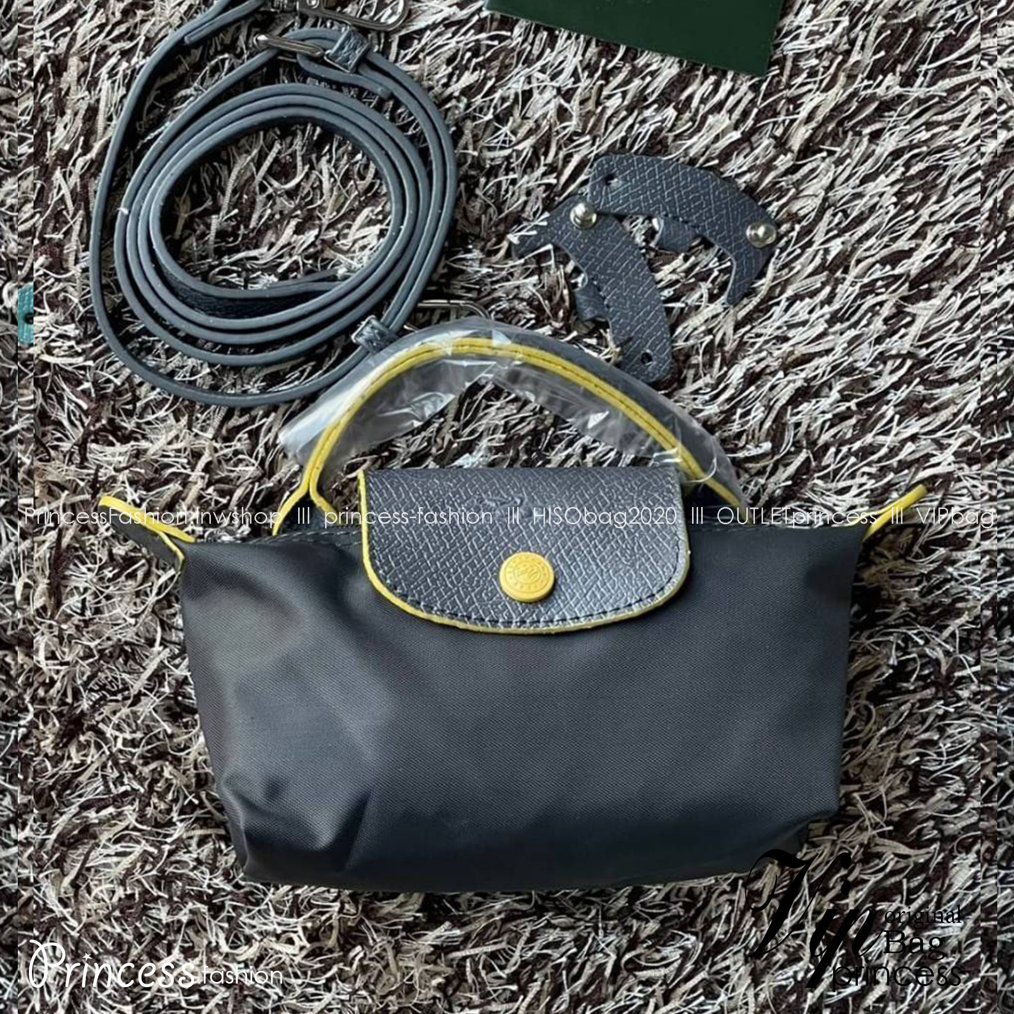 LONGCHAMP LE PLIAGE ORIGINAL Pouch with handle กระเป๋าถือขนาดมินิทรงpouch ให้ความหรูหราจาก Le Pliage (เลอ ปลิยาจ) ในขณะที่ที่ปิดแบบซิปช่วยให้คุณมั่นใจได้