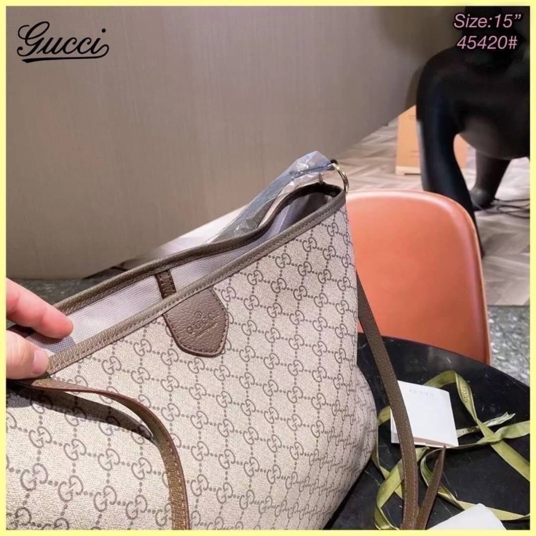 GUCCI Tote Bag / GG Ophidia Tote Bag กระเป๋าสะพายโท้ทใบใหญ่ คลาสสิคโมโนแกรมสุดหรู วัสดุแคนวาสตัดขอบหนัง ภายในเป็นช่องโล่งกว้าง จุของได้เยอะ หยิบจับสะดวก ใช้งานสะดวกสามารถสะพายได้ทุกวัน