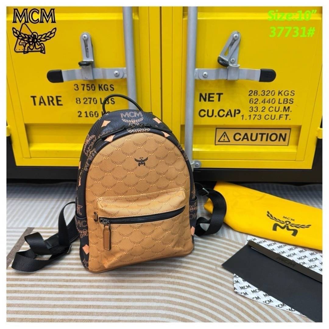 ORI | M.C.M Stark Backpack in Monogram Mix กระเป๋าเป้แมกซี่คอลใหม่ โดดเด่นด้วยดีไซน์สีดำด้านข้างและสายกระเป๋าตัดสีกันได้อย่างลงตัว Best seller Unisex ของงานเป้จริงๆ