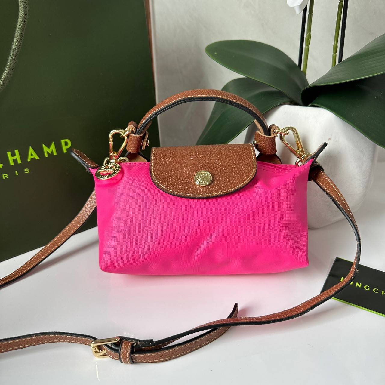 LONGCHAMP LE PLIAGE ORIGINAL Pouch with handle กระเป๋าใบเล็กขนาดกระทัดเหมาะกับใส่ของจำเป็นจุกจิก กันน้ำได้ พร้อมส่ง