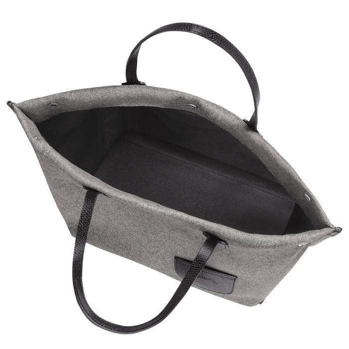 LONGCHAMP ROSEAU ESSENTIAL Shopping bag กระเป๋า Tote วัสดุผ้าขนสัตว์ ซับในผ้าฝ้ายที่จับด้านบนหนังวัว กระเป๋าสะพายใบนี้มีขนาดพอเหมาะ ดีไซน์หรูหรานี้สามารถสะพายไหล่หรือถือในมือก็ได้ นุ่มและน้ำหนักเบา