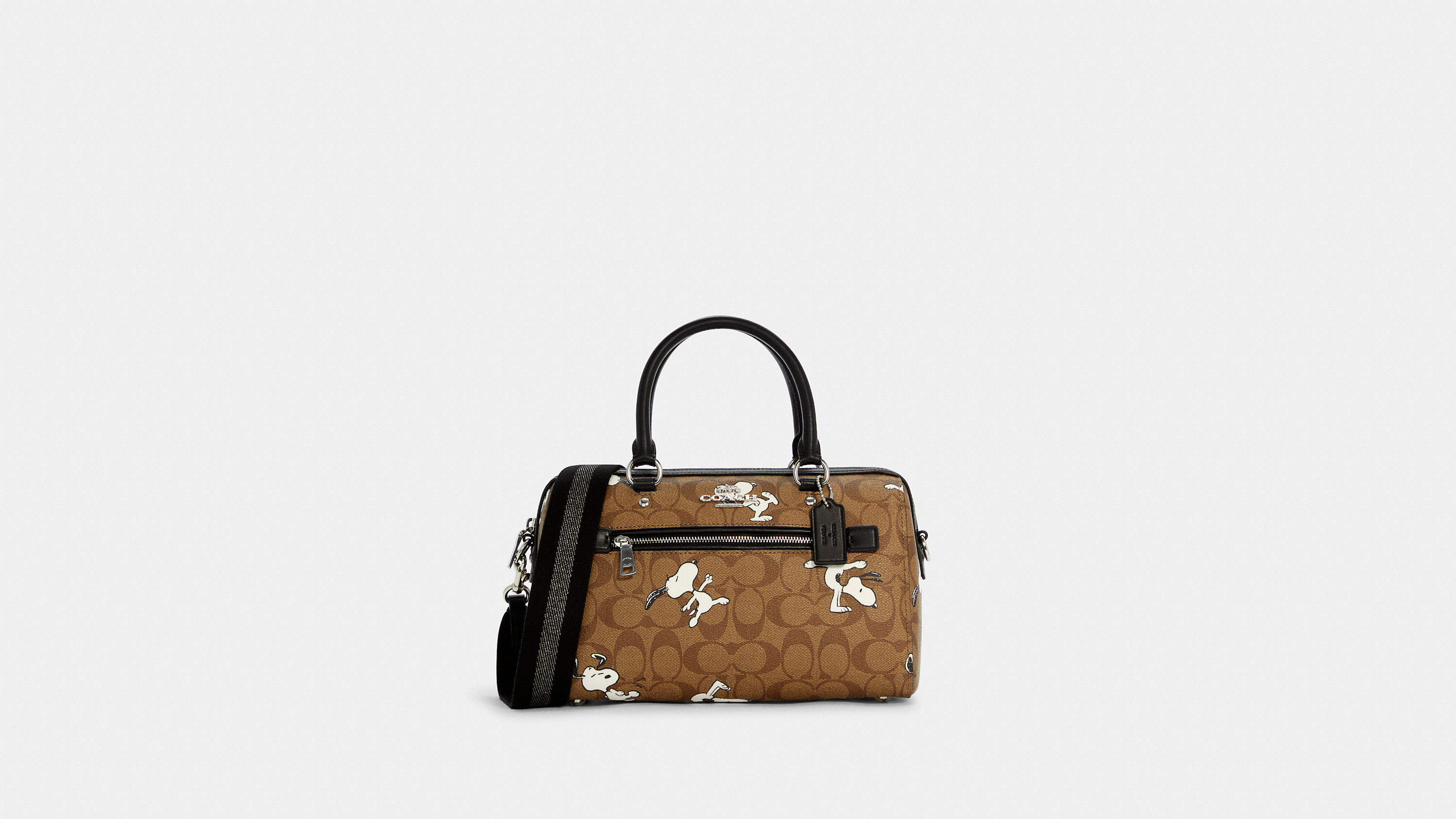 COACH C4118 COACH x PEANUTS ROWAN SATCHEL IN SIGNATURE CANVAS WITH SNOPPY PRINT สนูปพีที่สุดของคอลเลคชั่นแห่งความน่ารัก มาในดีไซน์ของกระเป๋าทรงหมอนยอดฮิต คลาสสิคใช้งานได้ไม่มีเบื่อ รอบนี้มาให้พร้อมสายสะพาย crossbody แบบสปอร์ต ทำให้ใช้งานได้อย่างกระฉับกระเ