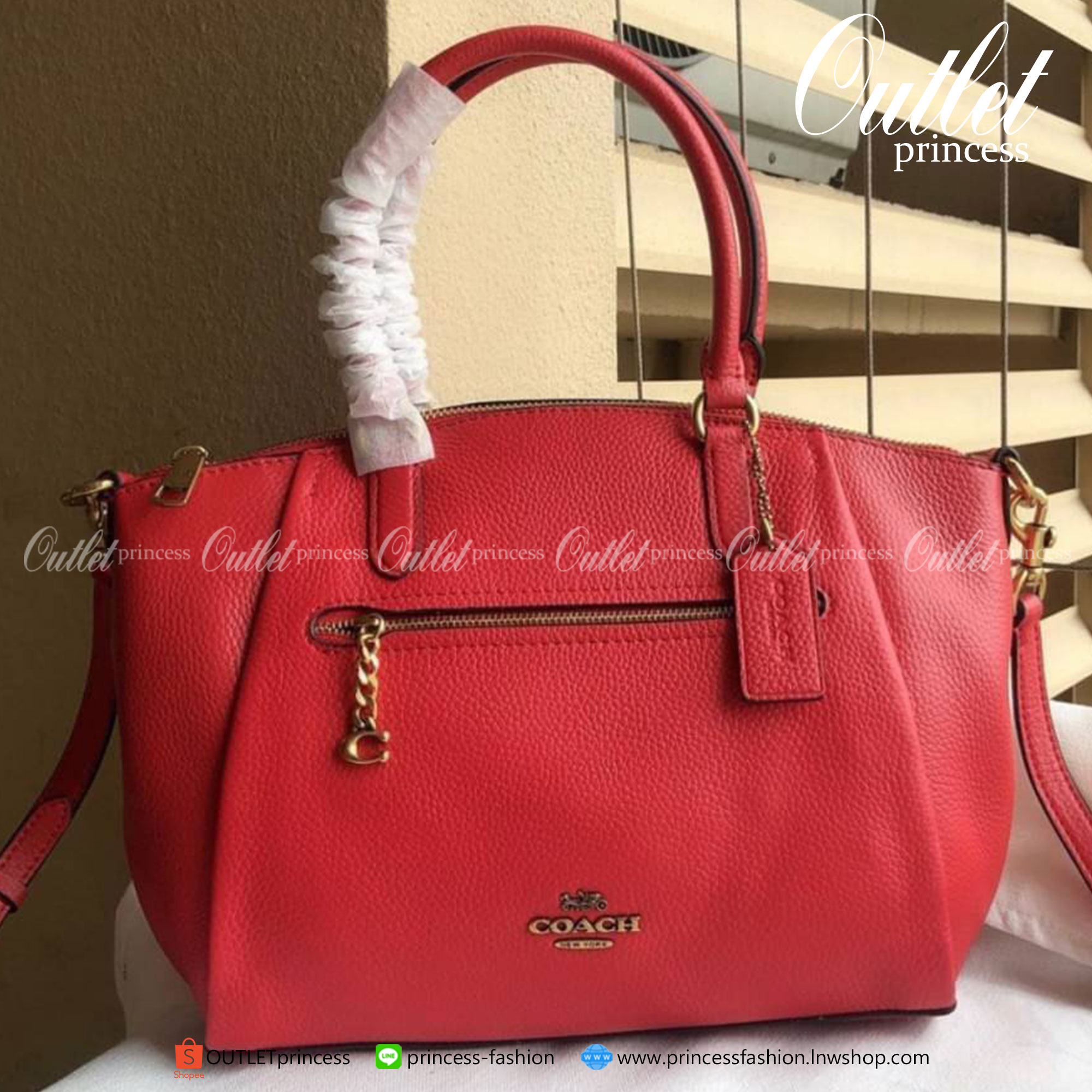 Coach Elise Satchel Polished pebble leather Inside zip and snap pockets Zip-top closure, fabric lining Handles