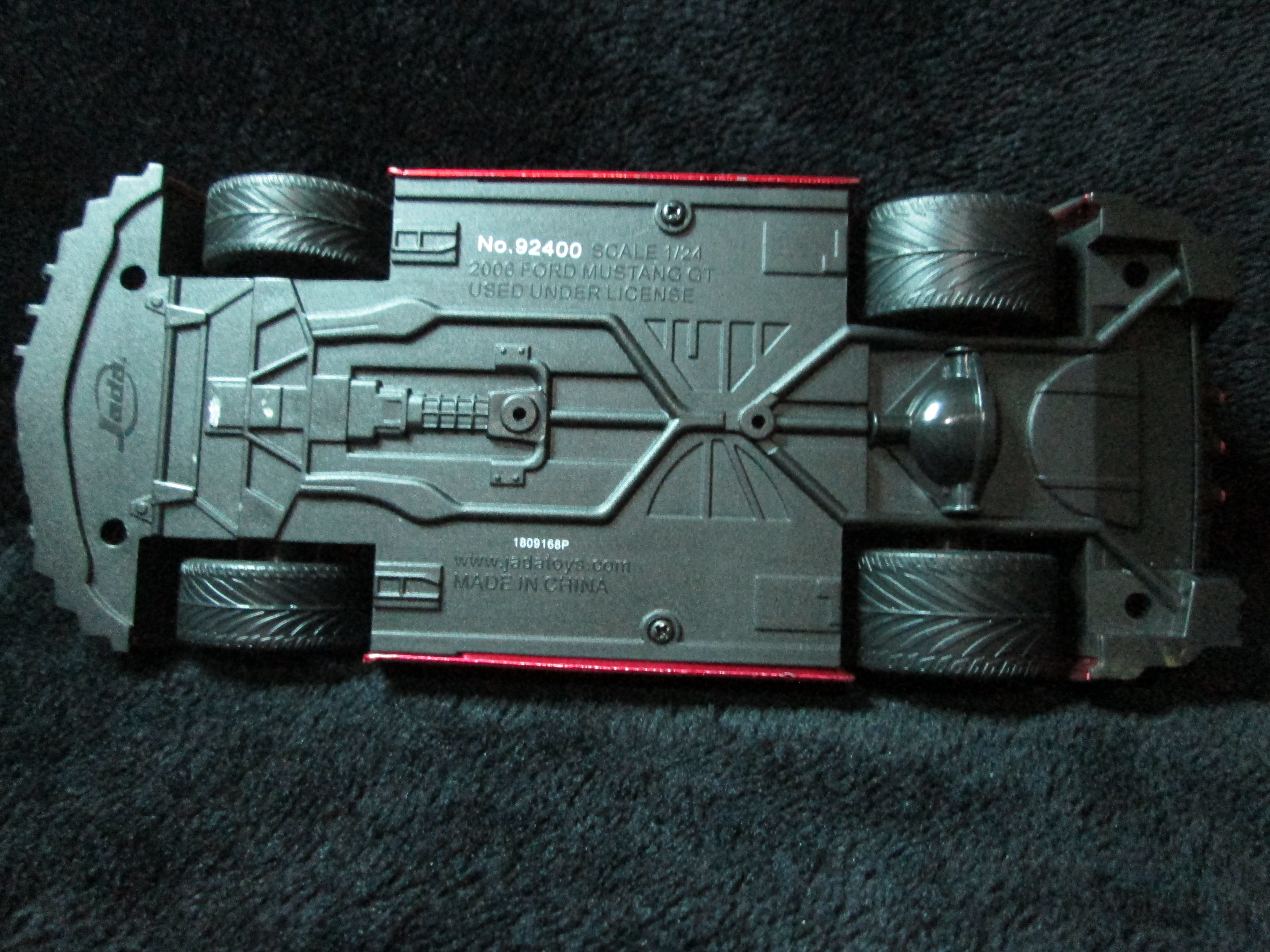 รถเหล็ก JADA - BATTLE MACHINES 2006 FORD MUSTANG GT 1/24 DIRT RED ใช้สำหรับตั้งโชว์ สภาพเหมือนใหม่