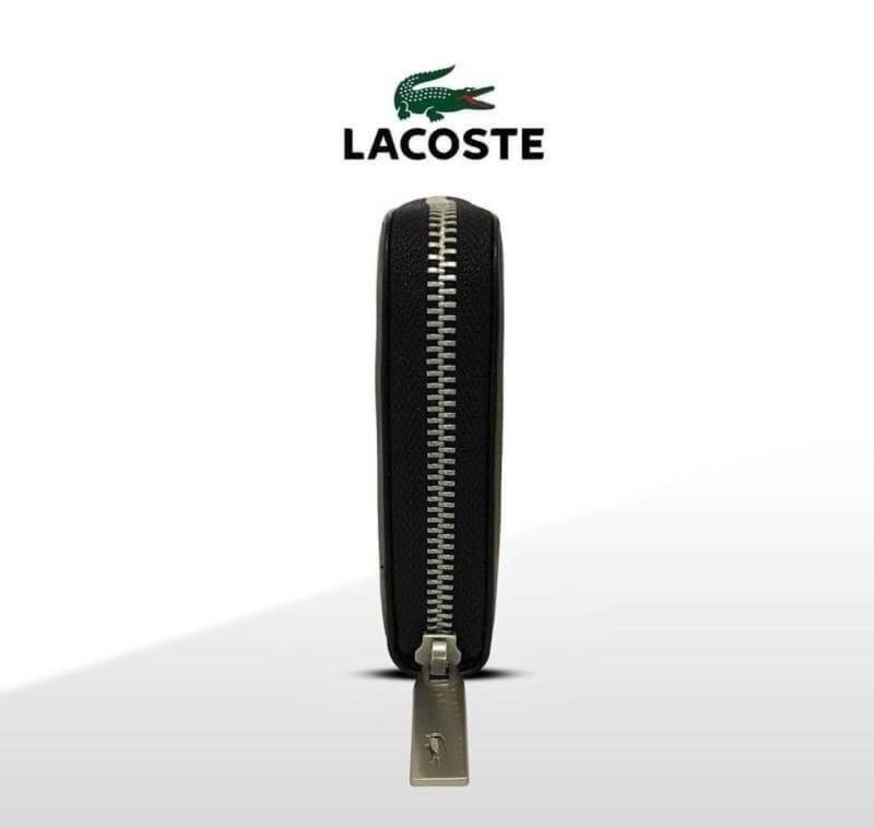 LACOSTE FACTORY LONG WALLET กระเป๋าสตางค์ใบยาวรุ่นใหม่ล่าสุดหนังสวยอยู่ทรงเปิดปิดด้วยซิปรอบด้านหน้ามีโลโก้แบรนด์เรียบหรู ภายในมีโลโก้ ช่องซิป ช่องใส่บัตรหลายช่องใส่มือถือ iphone8 เหรียญ บัตรได้เยอะ ตัวจริงสวยน่าใช้คลาสสิคไม่มีเอ้าท์ ราคาสุดคุ้ม สินค้ามาพร
