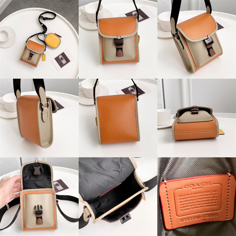 Coach C2600 Classic Logo Canvas Charter / COACH CHARTER NORTH/SOUTH CROSSBODY WITH HYBRID POUCH IN SIGNATURE CANVAS กลับมาเอาใจหนุ่มๆกันอีกครั้ง!! หล่อได้ไม่ซ้ำใคร กับไอเท็มสุดหรู กระเป๋าสะพายข้างรุ่นนี้ ดีไซน์ทรงกล่อง เรียบหรู วัสดุหนังแคนวาสสลับหนังแท้ 