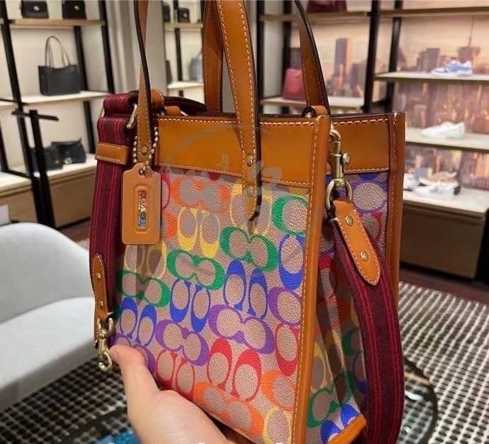 COACH C5142 COACH FIELD TOTE 22 IN RAINBOW SIGNATURE a celebration of equality, and authentic self-expression within the LGBTQIA+ community