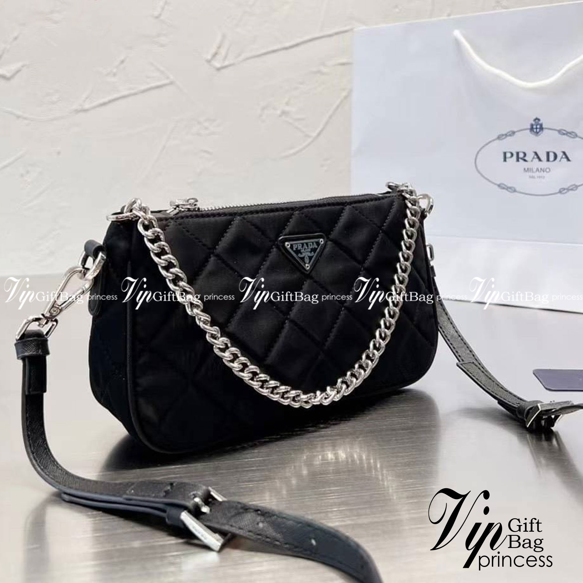 PRADA Tessuto Nylon Quilted Convertible Top Handle Sling Bag / PRADA Nylon Shoulder Bag กระเป๋าสะพายรุ่น Every Day Look ได้เลยค่ะ รุ่นแนะนำ วัสดุเป็น Nylon เนื้อดี บุเดินเส้นลายตารางดีไซน์ยอดนิยม ขนาดกำลังดี น้ำหนักเบา ด้านหน้าประดับโลโก้แบรนด์อะไหล่เงินส