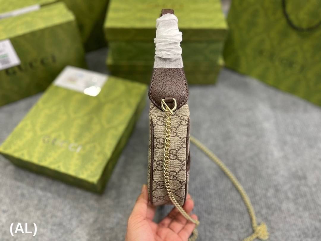 GUCCI half-moon Ophidia mini shoulder bag กระเป๋าสะพายไหล่รูปทรงพระจันทร์เสี้ยว Canvas GG Supreme กระเป๋าขนาดมินิให้ความรู้สึกย้อนยุคอันโดดเด่น สไตส์วินเทจ