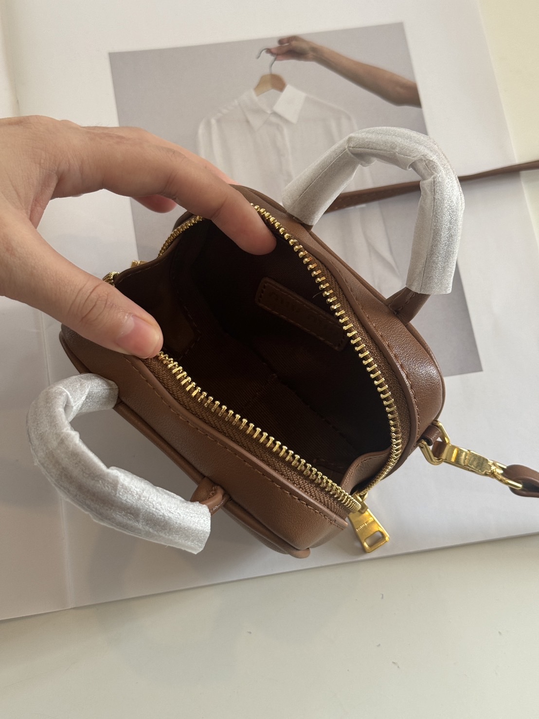 MIUMIU Leather micro bag / MIUMIU Mini Bag กระเป๋าถือสะพายใบเล็ก เกรดออริ 1:1 ใช้งานต่างประเทศได้ ภาพถ่ายจากงานขายจริง