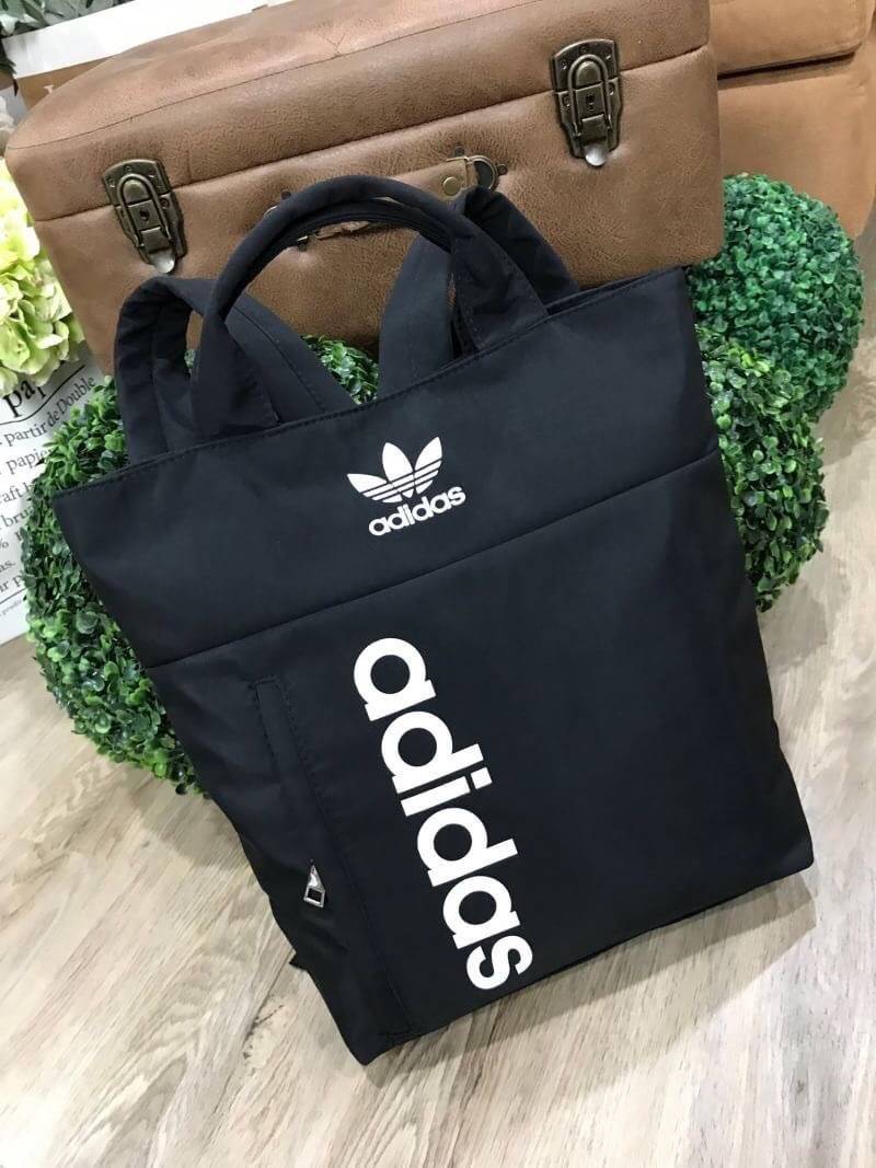 ADIDAS 2WAY MINI BACKPACK กระเป๋าเป้หรือสะพาย2Wayสไตล์ Sport ขนาดมินิ น้ำหนักเบา ด้านหน้ามีโล้โก้และช่องซิป เปิดปิดด้วยซิปสะดวกใช้ ภายในมีช่องใส่ของ หูจับถนัดมือ สายสะพายเลื่อนปรับได้ สามารถถือหรือสะพายเป็นเป้ได้ ใช้ได้ทั้งชายหญิง ไอเท็มใหม่ราคาสุดคุ้ม! ห