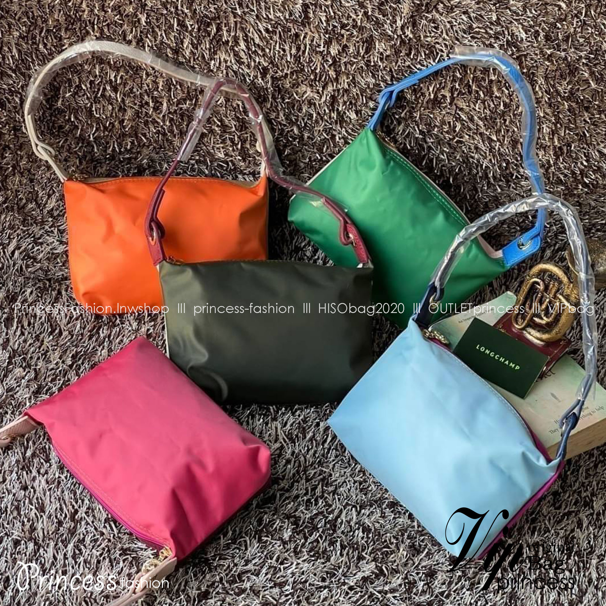 LONGCHAMP LE PLIAGE RE-PLAY Shoulder bag แฟน ๆ ของกระเป๋าไนลอนพกพาอันเป็นเอกลักษณ์ของแบรนด์ ตอนนี้มีคอลเลกชั่นใหม่ล่าสุดให้เลือกสรร