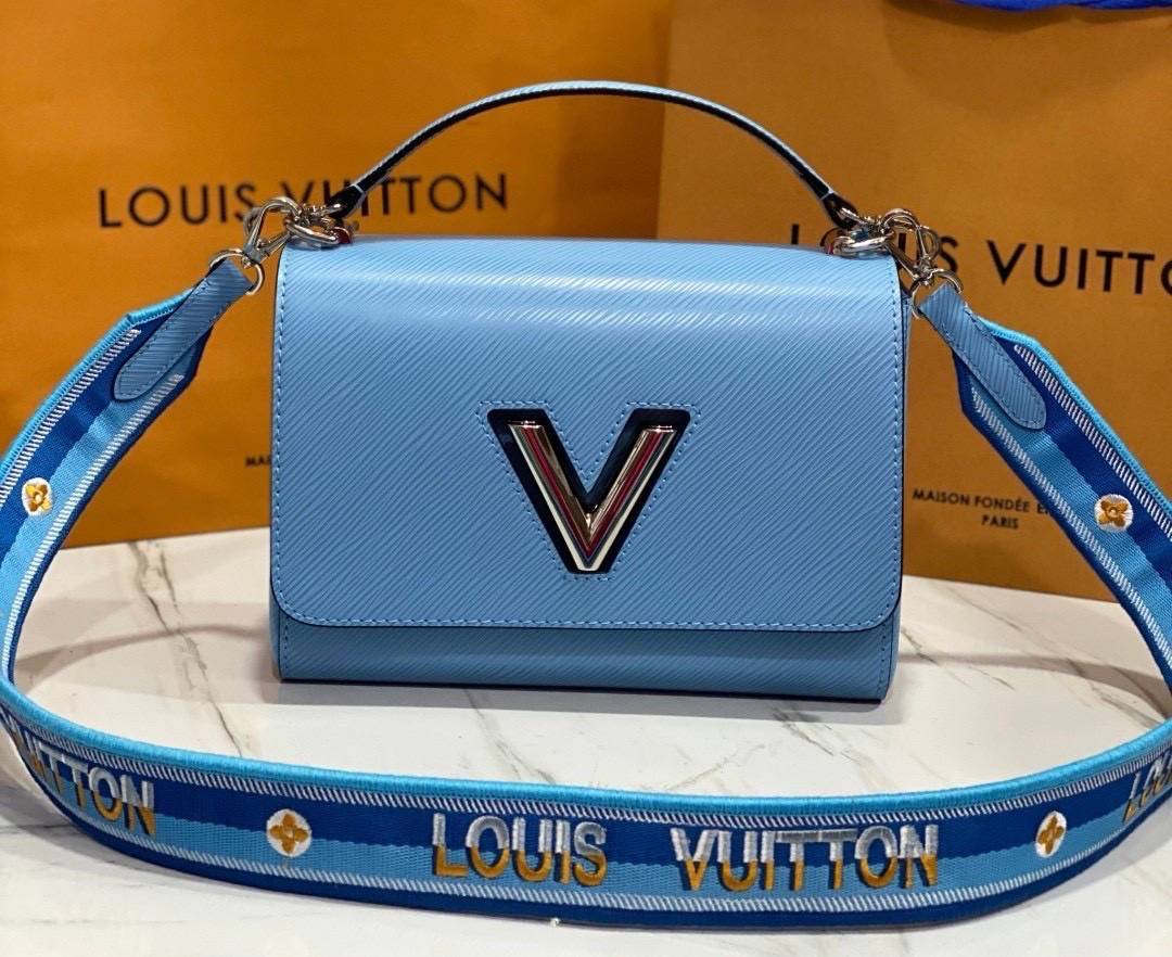 ORI หนังแท้ | LV Twist MM bag Epi grain leather กระเป๋าสะพาย/กระเป๋าถือรุ่น พร้อมสายสปอร์ต หนังลายเกรน Epi โดดเด่นด้วยโลโก้หน้า สวยหรูเป็นเอกลักษณ์ ดีไซน์คัลเลอร์บล็อค สัมผัสโดดเด่นแมตช์กับทุกสไตล์