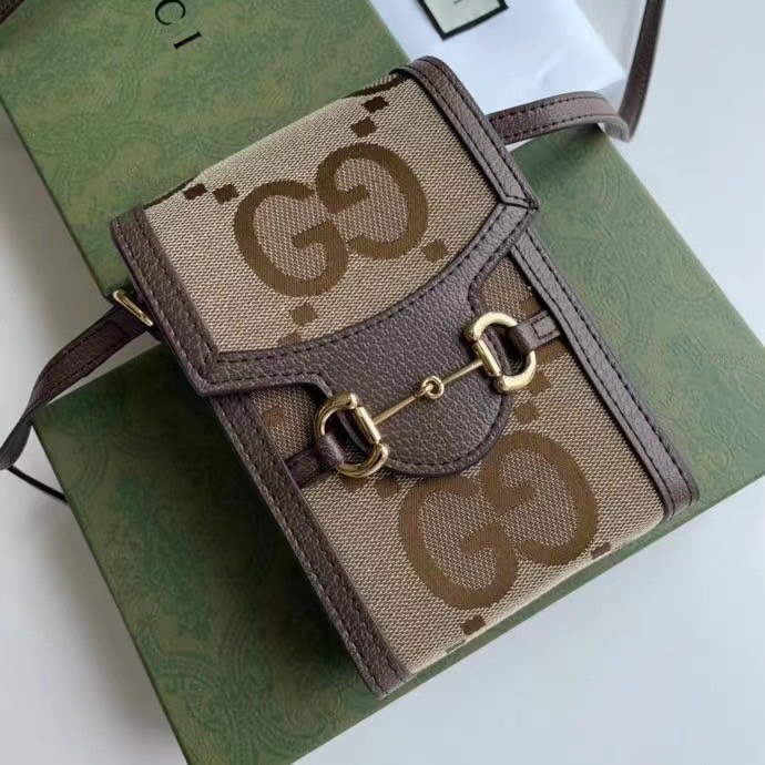 Gucci Jumbo GG mini bag / Gucci Phone Bag เกรดใช้งานสลับใบจริงได้ ออริจินอล รุ่นยอดฮิต ไซส์มินิ ที่ใครๆก็ต้องรู้จัก!! กับคอลเล็กชั่น Gucci Love Parade กระเป๋าขนาดมินิใบนี้รังสรรค์ด้วยผ้าแคนวาส GG จัมโบ้พร้อมตกแต่งด้วยฮาร์ดแวร์ฮอร์สบิต