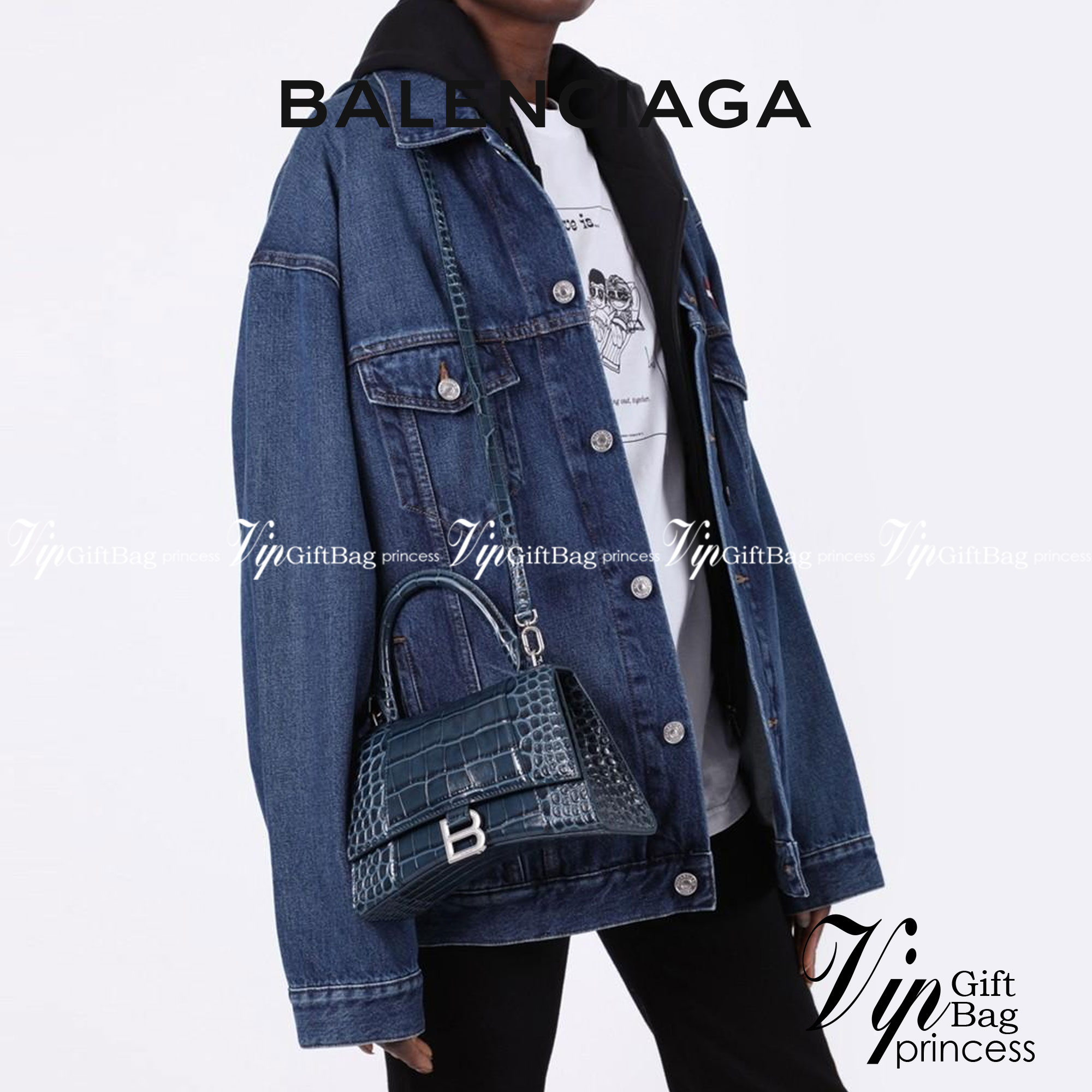 หนังแท้ BALENCIAGA HOURGLASS TOP HANDLE XS Shiny crocodile embossed calfskin การสร้างสรรค์ที่มีเอกลักษณ์เฉพาะตัว หรูหรา โทนสีโดดเด่น วัสดุหนังแท้ลายจระเข้ ภายในโล่งกว้างหนังแนปป้าอย่างดี เกรดออริจินอล ตอบโจทย์ได้ทุกลุค ทุกไลฟ์สไตล์ ภาพสินค้าถ่ายจากงานขายจ