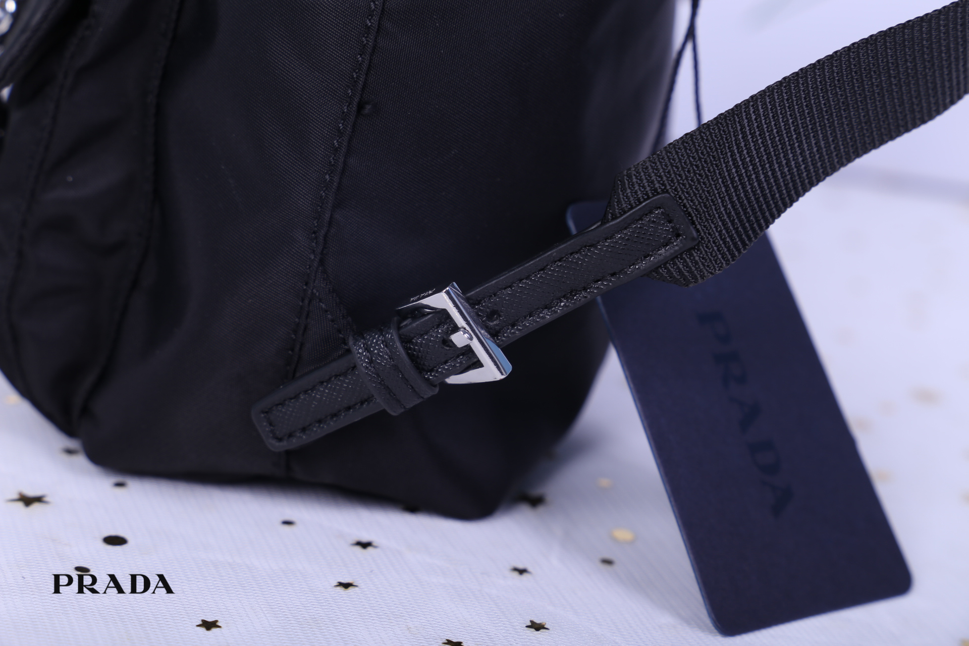 Prada Black Nylon Mini Double Buckle Backpack Crossbody Bag รุ่นนี้เป็นทรงเป้มินิน่ารักๆๆ ด้านในโล่งกว้าง ซับด้านในพิมพ์ลายแบรนด์ ใส่ของจุกจิง โทรศัพท์ กระเป๋าตังใบสั้น เครื่องสำอาง ได้แบบสบาย อะไหล่เงินทั้งใบ บอกเลยว่ารุ่นนี้สวย น่ารัก จะถือหรือสะพายก็ดู