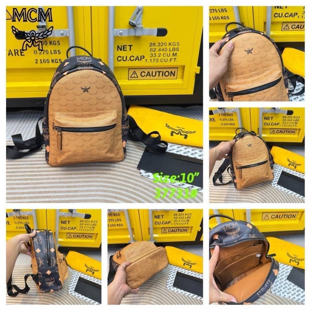 ORI | M.C.M Stark Backpack in Monogram Mix กระเป๋าเป้แมกซี่คอลใหม่ โดดเด่นด้วยดีไซน์สีดำด้านข้างและสายกระเป๋าตัดสีกันได้อย่างลงตัว Best seller Unisex ของงานเป้จริงๆ