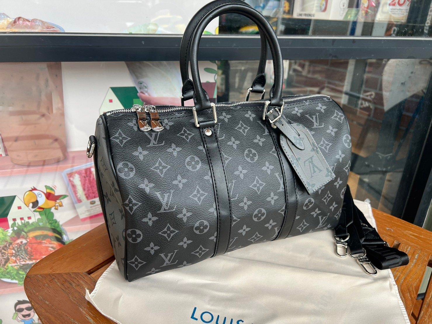 LV Keepall Bandouliere / LV Travel Bag พร้อมส่ง กระเป๋าเดินทางสุดคลาสสิค เรียบหรูมีระดับในวัสดุ Monogram Eclipse แคนวาส