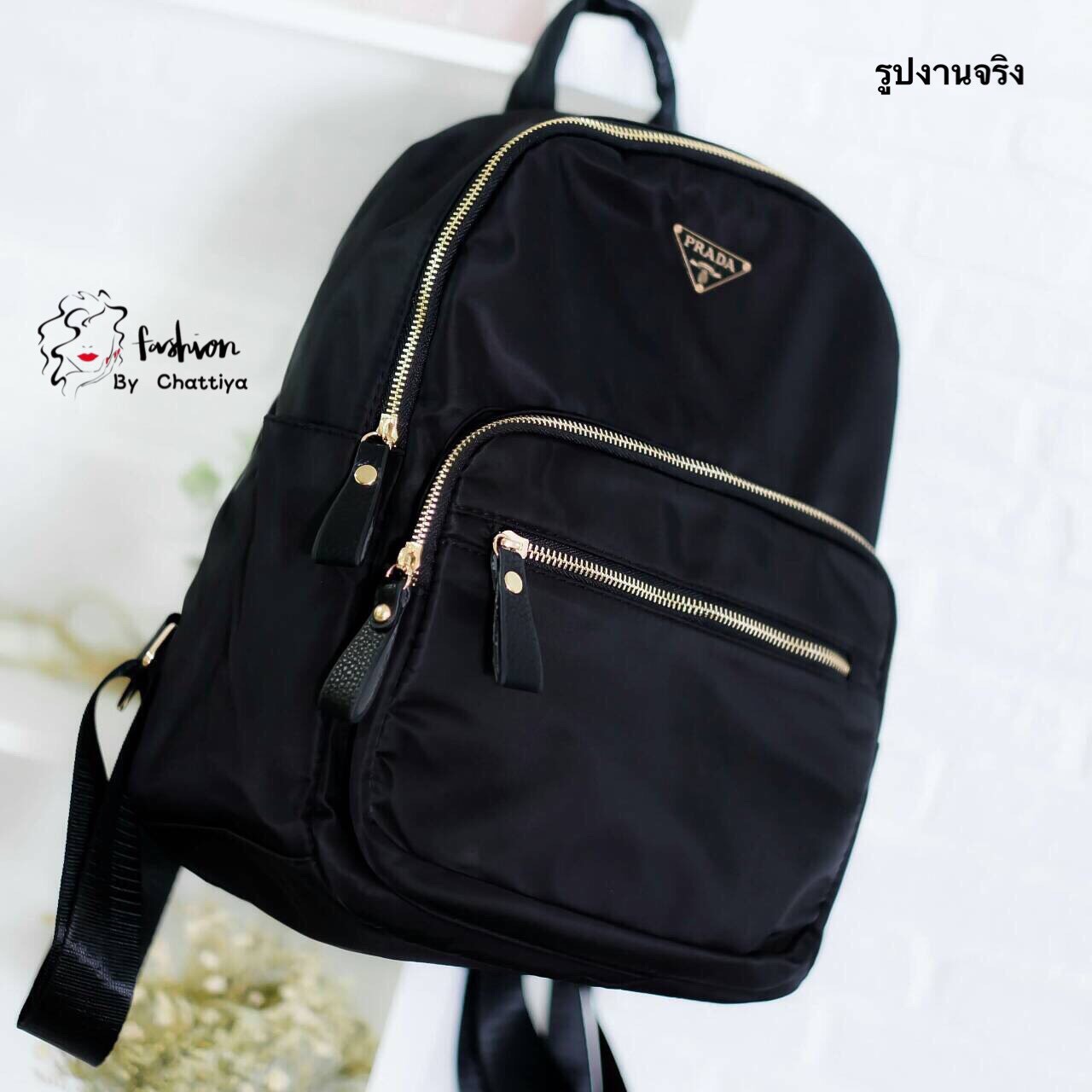 Prada nylon backpack fashion bag by Chattiya Brand:Prada Detail:รอบนี้จัดหนักสำหรับเป้รับซัมเมอร์ จัดมาให้เลือกหลายแบบ ใบนี้ก็เช่นกันเพิ่มความจุและเพิ่มช่องให้สำหรับคนมีของ ต้องจัดเต็ม ตัวกป.เป็น nylon เนื้อดี กันน้ำได้ซิปกว้างทั้ง 3 ช่องแบ่งให้ไม่ต้องถาม