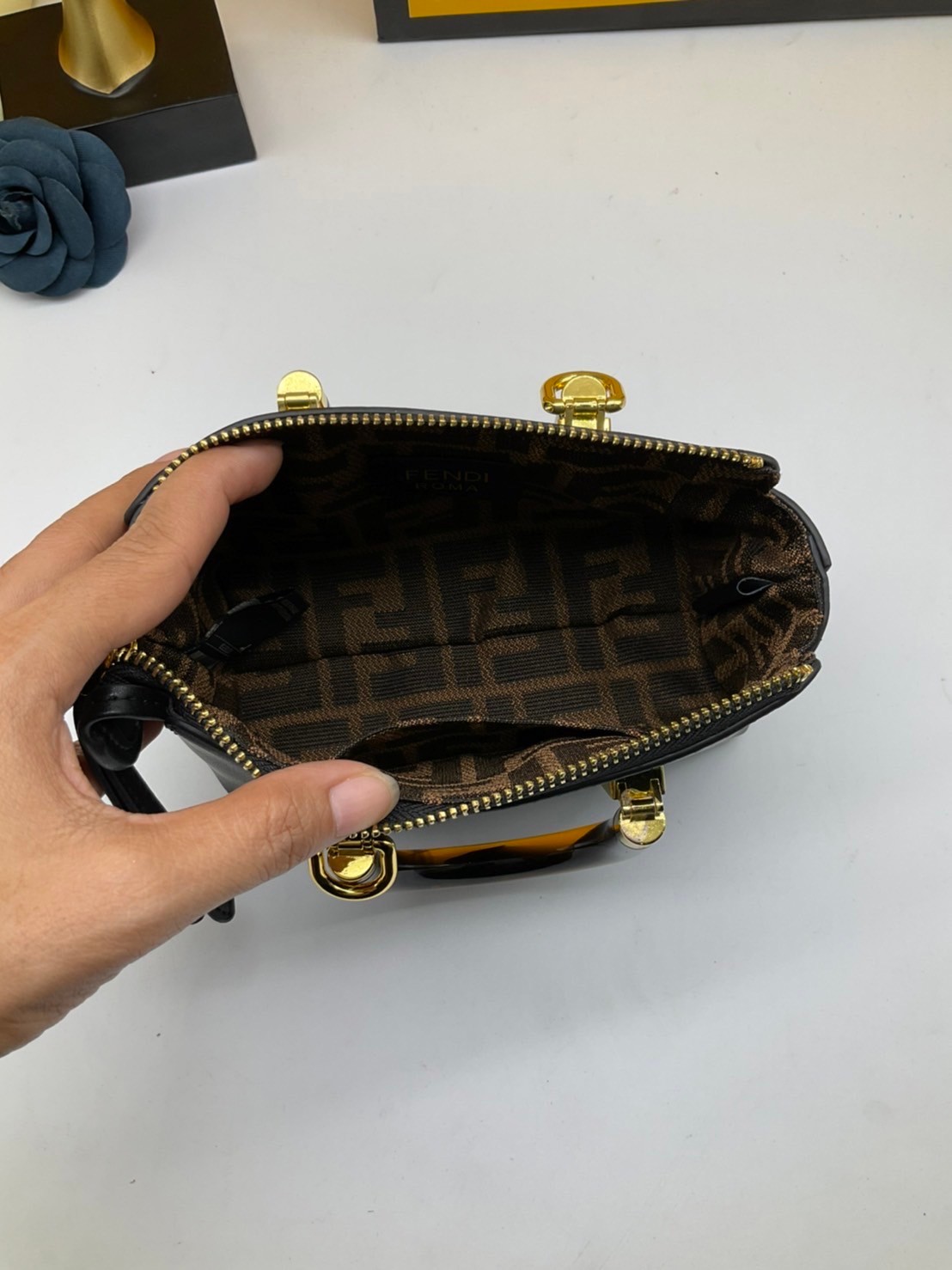 FENDI By The Way Mini Bag พร้อมส่งที่ไทย ภาพถ่ายจากงานขายจริง Iconic mini By The Way Boston bag made FENDI ROMA lettering and rigid tortoiseshell-effect plexiglass handles.