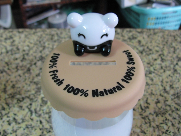 กระปุกออมสินขวดนม รสช็อกโกแลตค่ะ