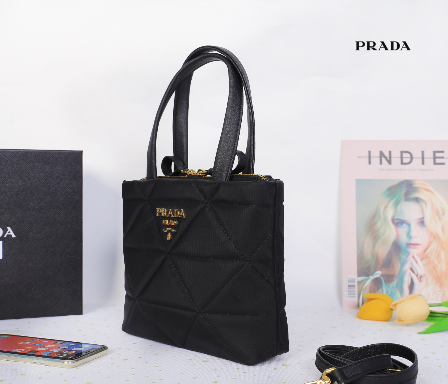 Prada Re-Nylon padded tote bag / Prada Logo Plaque Cross Body Phone Case กระเป๋า Crossbody สุดเก๋ วัสดุ Nylon เปิด-ปิด ด้วยซิป ด้านหน้าประดับด้วยโลโก้แบรนด์ น้ำหนักเบา ด้านในเป็นช่องโล่งกว้าง ซับในพิมพ์ลายแบรนด์สวย ตามแบบฉบับ ใส่ I Phone ได้สบายเลยค่ะ บอก