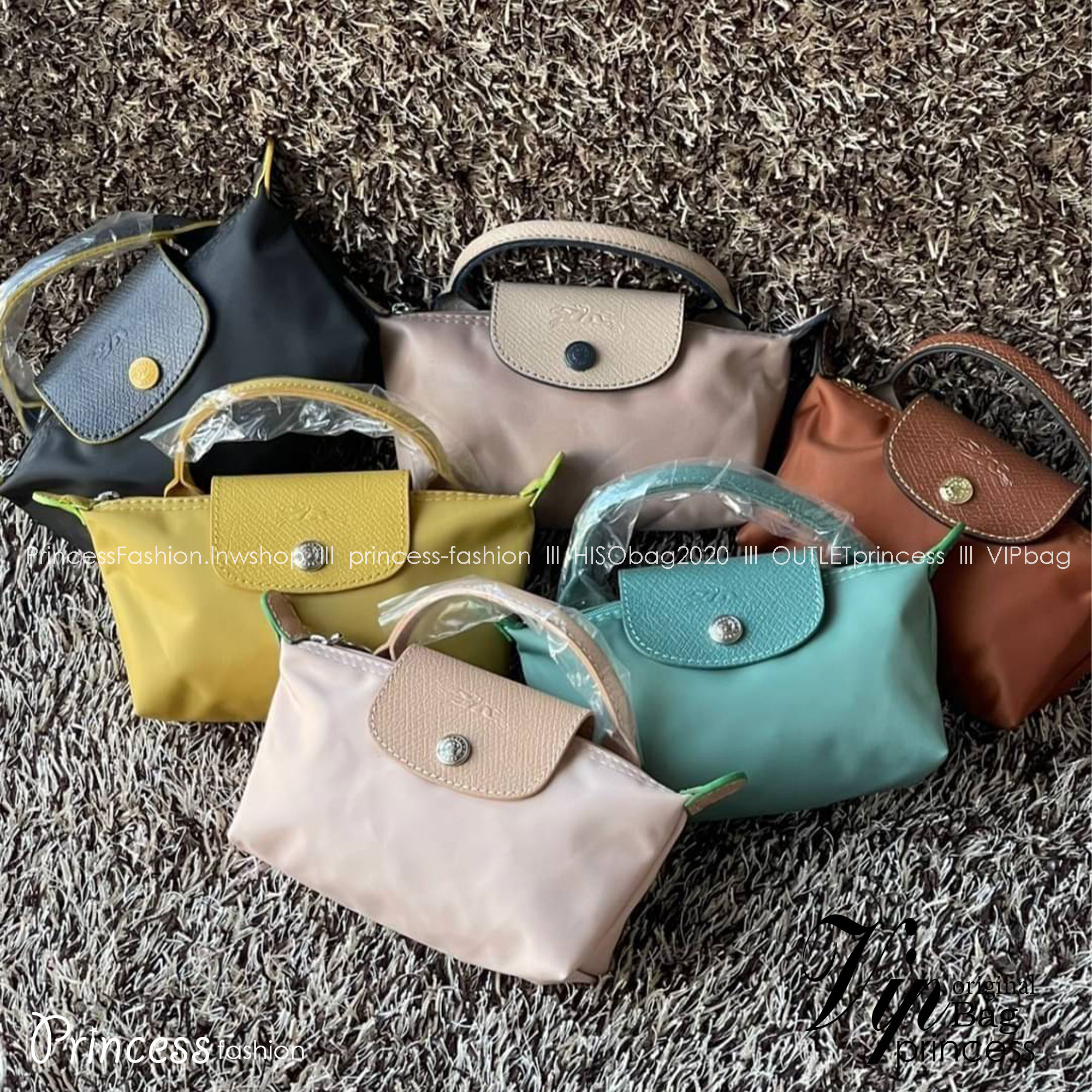 LONGCHAMP LE PLIAGE ORIGINAL Pouch with handle กระเป๋าถือขนาดมินิทรงpouch ให้ความหรูหราจาก Le Pliage (เลอ ปลิยาจ) ในขณะที่ที่ปิดแบบซิปช่วยให้คุณมั่นใจได้