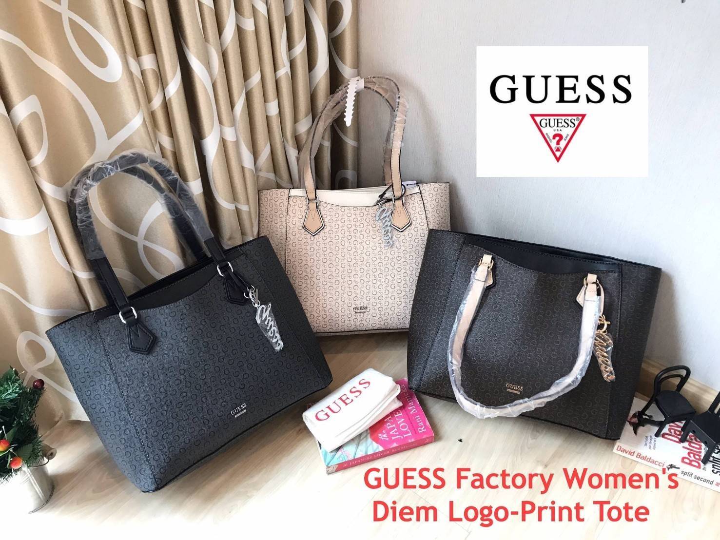 GUESS Factory Women's Diem Logo-Print Tote กระเป๋าถือหรือสะพายไหล่ ใบใหญ่ pu. เนื้อดี ลายแบรนด์ รอบใบ พร้อมพวงกุญแบรนด์ ภายในแบ่งช่องเป็นสัดส่วน จุได้เยอะ ใส่ A4 ได้ หูหิ้วสะพ่ยไหล่ได้ค่ะ
