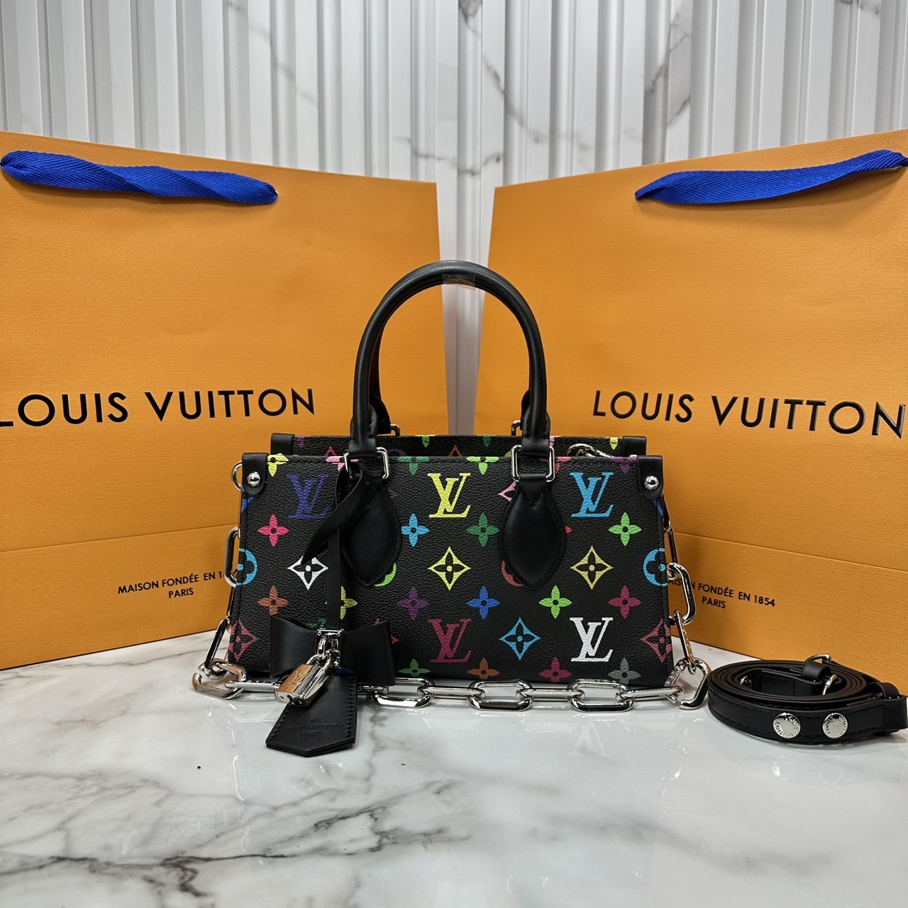 ORI หนังแท้ | LV x TM bolsa OnTheGo East West Multicolor กระเป๋าสะพายทรงโท้ทที่ใครเห็นต้องเป็นหลงรัก คอลใหม่ดีไซน์เฉดสีสันสดใส