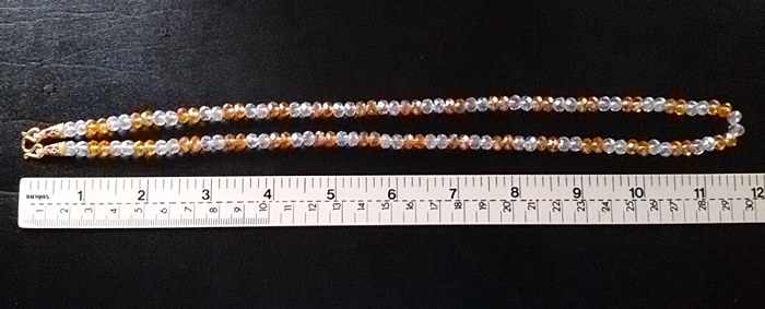 สร้อยคอคริสตัลส้มสลับขาว(ใส่พระได้1องค์)ค่ะ