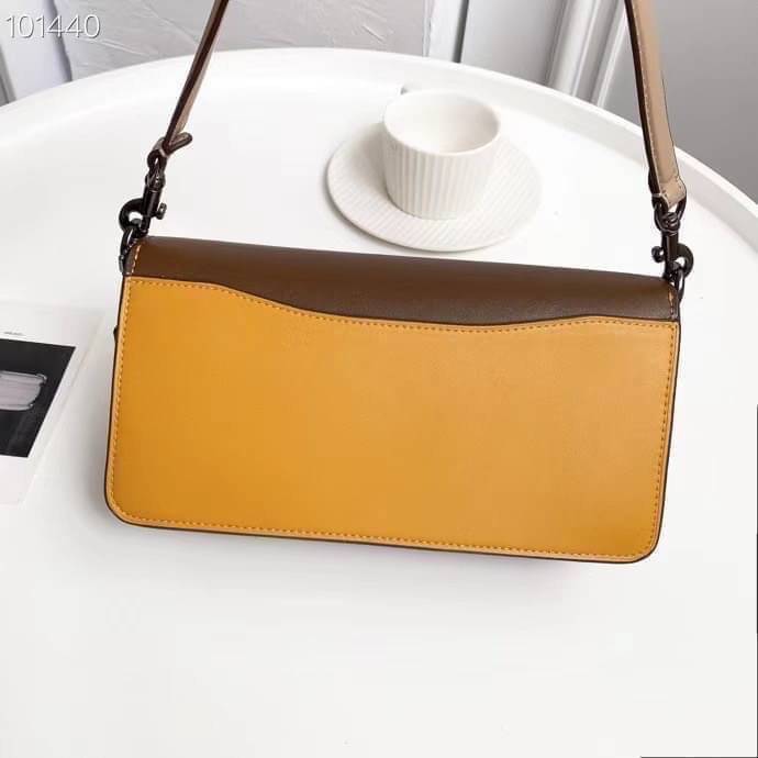 Coach Tabby Shoulder Bag 26 Polished pebble leather, suede and refined calf leather Inside zip and multifunction pockets