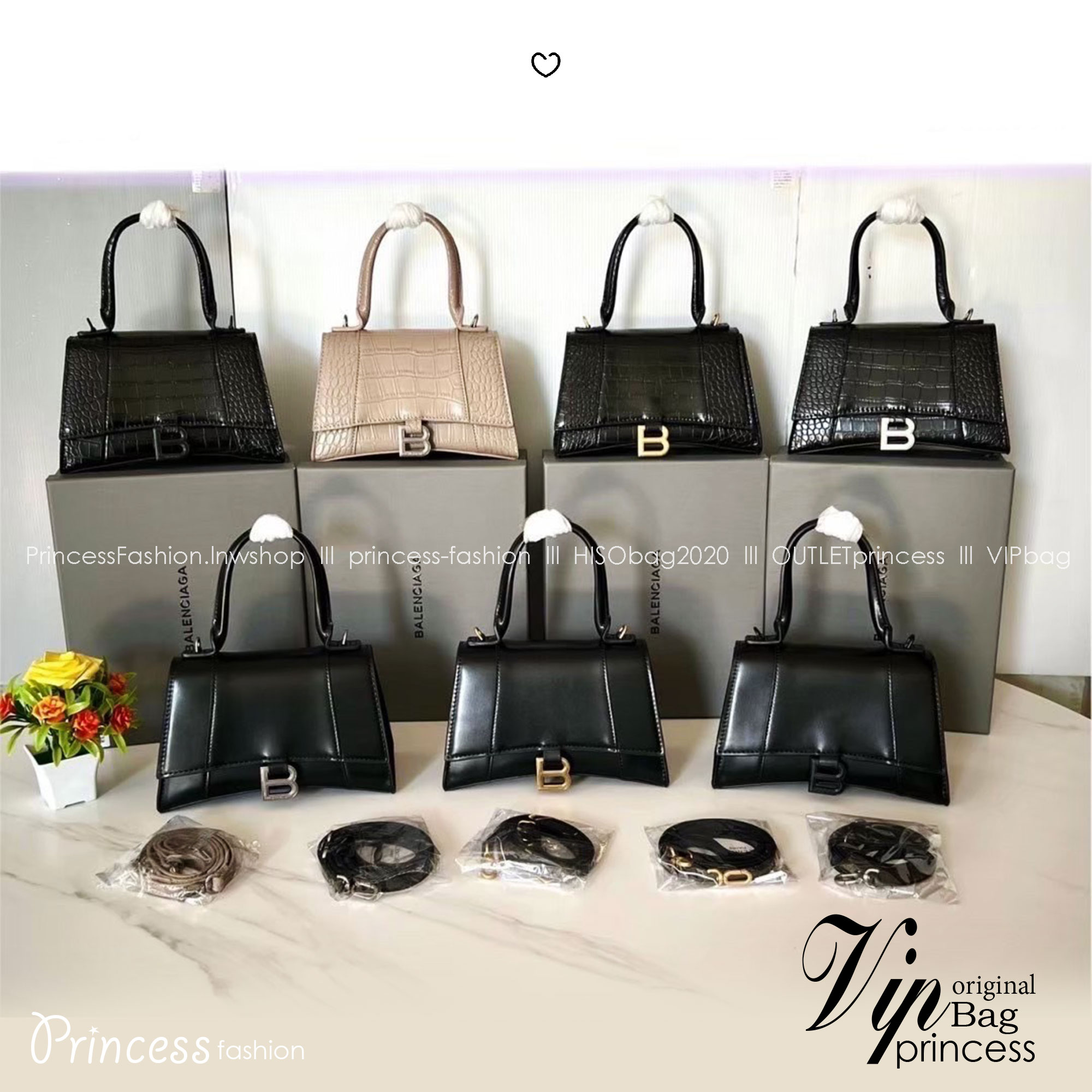 BALENCIAGA Hourglass top-handle tote bag กระเป๋าสะพายแบรนด์หรูซิกเนเจอร์ ที่มาพร้อมดีไซน์โดดเด่น มีความโฉบเฉี่ยว โค้งมนเหมือนพระจันทร์เสี้ยว เพิ่มความสวยสะดุดตาด้วยการตกแต่งอักษร B เมทัลลิก