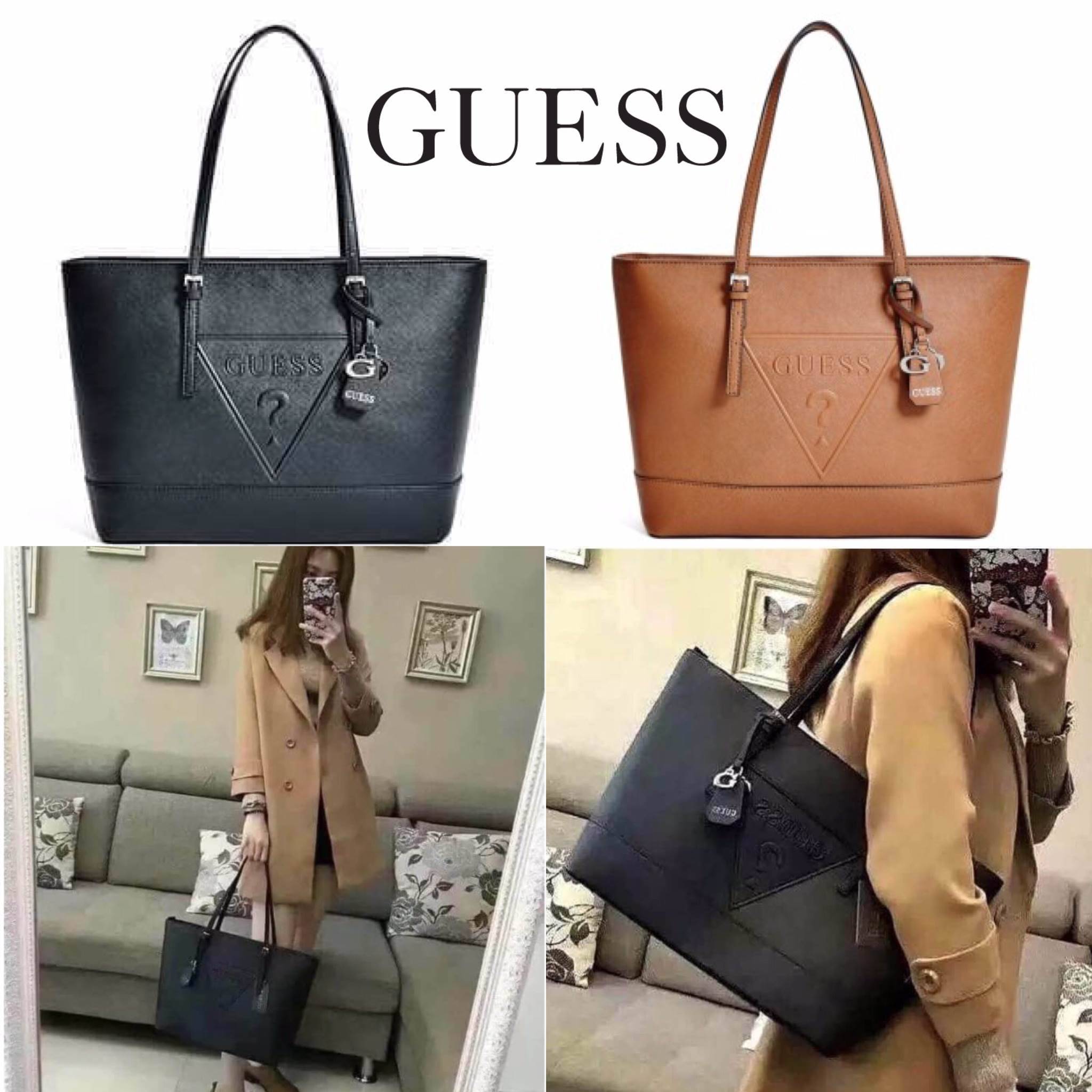 ReStock! พร้อมส่งดำ/น้ำตาลค่ะ GUESS SAFFIANO SHOPPER BAG กระเป๋าสะพายทรง Tote จากแบร์น GUESS วัสดุหนัง Saffiano สวยอยู่ทรงสไตล์ PRADA ขนาดใหญ่ น้ำหนักเบา ด้านหน้าปั้มโลโก้แบรนด์ พร้อมห้อย TAG โลโก้อะไหล่ตัว G และรูปหัวใจที่หูกระเป๋าถอดเเยกใช้ได้ เปิดปิดด้