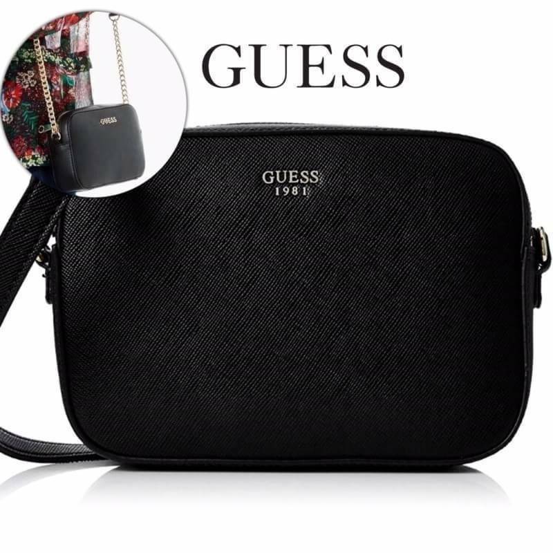GUESS SAFFIANO SLING BAG กระเป๋าถือหรือสะพายจาก GUESS FACTORY หนัง Saffiano สวยอยู่ทรงขนาดมินิกำลังน่ารัก ด้านหน้าประดับโลโก้แบรนด์อะไหล่เงิน เปิดปิดด้วยซิปสะดวกใช้ ภายในมีโลโก้สามารถใส่มือถือiphone8+ ของจุกจิกได้ มาพร้อมสายสะพายโซ่ต่อหนังปรับไม่ได้ Cross