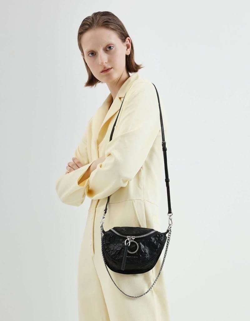 CHARLES & KEITH WRINKLED EFFECT RING ZIP TASSEL CROSSBODY BAG กระเป๋าสะพาย/คาดเอว/คาดอกรุ่นใหม่ล่าสุด เปิด-ปิดด้วยซิป ภายในโล่งกว้างมีช่องเล็กใส่บัตร จุของได้เยอะ ดีไซต์เก๋ไม่ซ้ำใคร มาพร้อมสายสะพาย 2 สายให้เลือกสะพายได้หลากหลายแบบไม่มีเบื่อแน่นอนจ้า