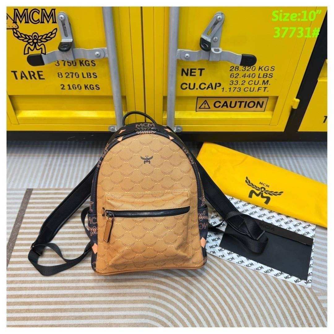 ORI | M.C.M Stark Backpack in Monogram Mix กระเป๋าเป้แมกซี่คอลใหม่ โดดเด่นด้วยดีไซน์สีดำด้านข้างและสายกระเป๋าตัดสีกันได้อย่างลงตัว Best seller Unisex ของงานเป้จริงๆ