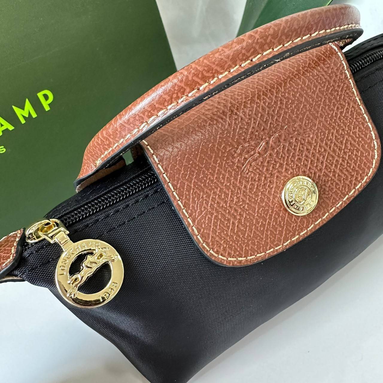 LONGCHAMP LE PLIAGE ORIGINAL Pouch with handle กระเป๋าใบเล็กขนาดกระทัดเหมาะกับใส่ของจำเป็นจุกจิก กันน้ำได้ พร้อมส่ง
