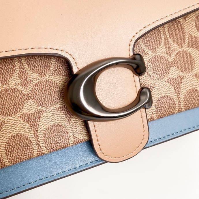 Coach Tabby Shoulder Bag 26 Polished pebble leather, suede and refined calf leather Inside zip and multifunction pockets