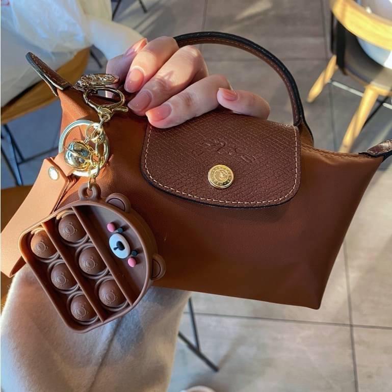 LONGCHAMP LE PLIAGE ORIGINAL Pouch with handle กระเป๋าใบเล็กขนาดกระทัดเหมาะกับใส่ของจำเป็นจุกจิก กันน้ำได้ พร้อมส่ง