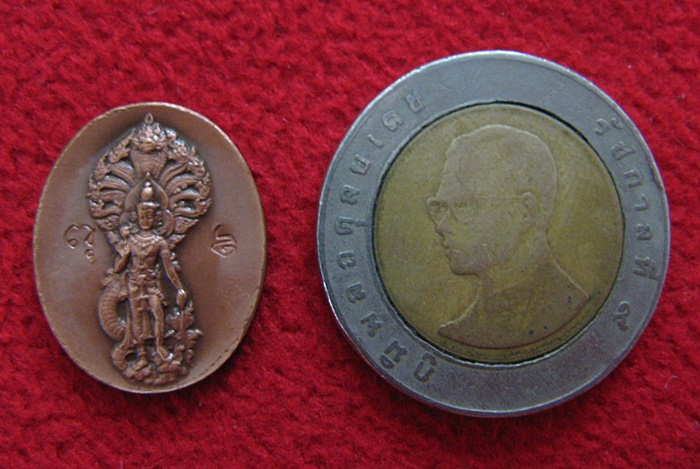 เหรียญเทพบุตรนาคราช สถาบันพยากรณ์ศาสตร์ เนื้อทองแดงรมดำ(พิมพ์เล็ก) ขนาด 2 เซนติเมตรค่ะ