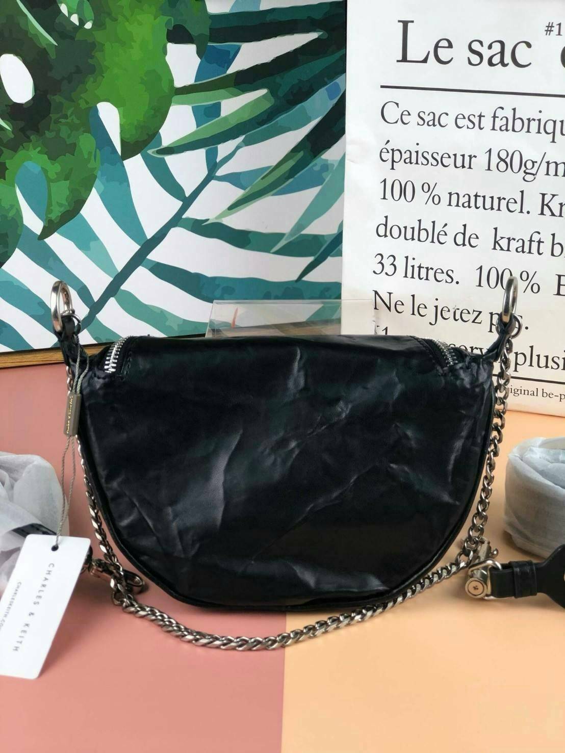 CHARLES & KEITH WRINKLED EFFECT RING ZIP TASSEL CROSSBODY BAG กระเป๋าสาระพัดประโยชน์ ใช้คาเอว คาดอก หรือจะสะพายแบบครอสบอดี้ได้ค่า 💥💥 มีโลโก้แบรนด์ที่ด้านหน้า เปิดปิดแบบซิปคู่เก๋ๆ ด้านในมีช่องใส่บัตรได้ 3 ช่อง รุ่นนี้ใส่ iPhone plus ได้พอดี