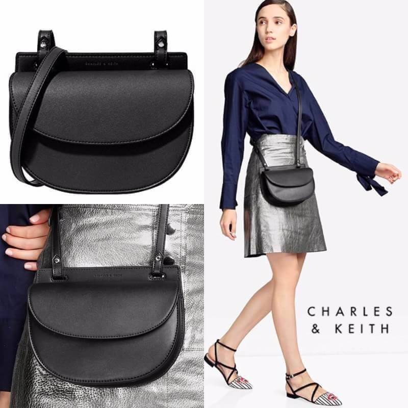 CHARLES & KEITH Half Moon Crossbody Bag Saddle กระเป๋าสะพายทรงเก๋ ขนาดกำลังน่ารัก หนังเรียบ สวยอยู่ทรง ด้านหน้ามี logo brand เปิดปิดด้วยฝาปิดแม่เหล็ก ด้านหลัง มี 1 ช่อง ภายในมีช่องใส่บัตร ใส่กระเป๋าสตางค์ยาว, มือถือทุกรุ่น และของจุกจิกได้เยอะ สายสะพายยาวป