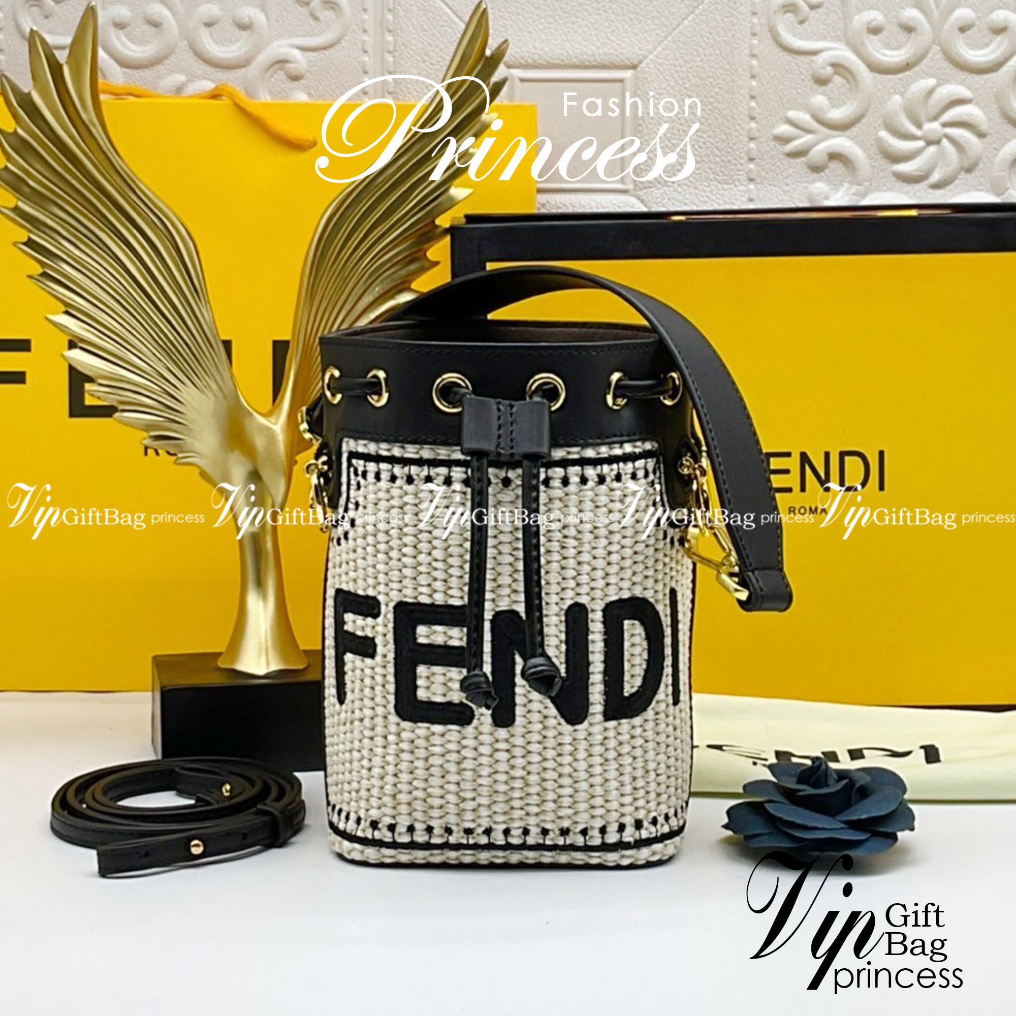 FENDI Mon Tresor Beige and black straw mini bag / Mon Tresor bucket bag made of natural-coloured woven straw with a moss-stitch effect, with black straw Fendi lettering. กระเป๋าสะพายทรงบัคเก็ตมินิน่ารัก อะไหล่ปั้มแบรนด์สีทอง Rare items เด็ดๆแบบนี้ห้ามพลาด