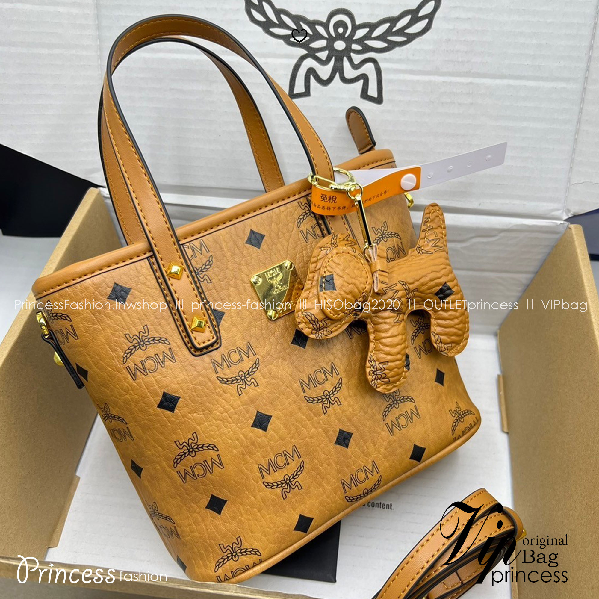 M.C.M Mini Anya Top Zip Shopper in Visetos กระเป๋าทรงโท้ท พร้อมพวงกุญแจน้องหมาห้อย พิมพ์ลายสวยงาม เกรดท็อปออริ 1:1 สลับแท้