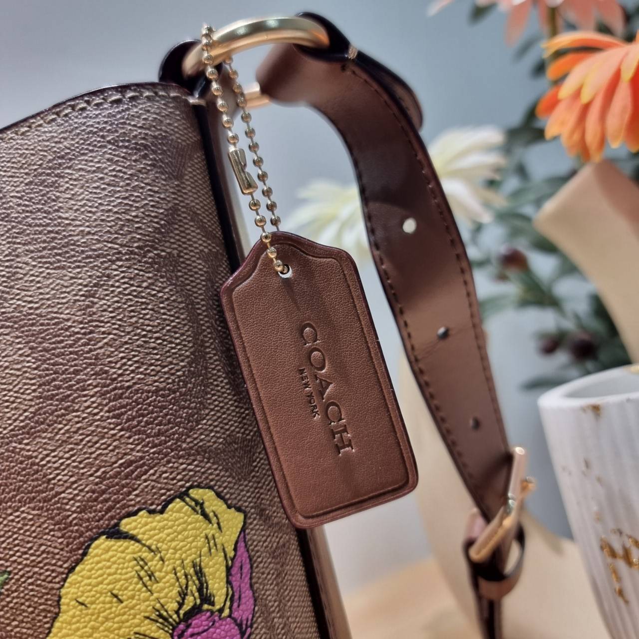 COACH CR155 SOPHIE BUCKET BAG IN SIGNATURE CANVAS WITH FLORAL PRINT กระเป๋าทรงบัคเก็ต ที่มีดีไซน์ลวดลายดอกไม้น่ารักน่าใช้ เกรดท็อปออริ 1:1 สลับแท้