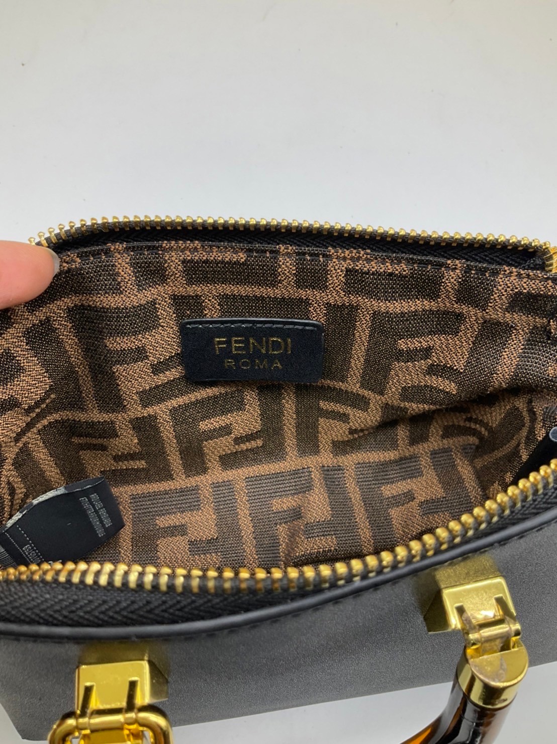 FENDI By The Way Mini Bag พร้อมส่งที่ไทย ภาพถ่ายจากงานขายจริง Iconic mini By The Way Boston bag made FENDI ROMA lettering and rigid tortoiseshell-effect plexiglass handles.