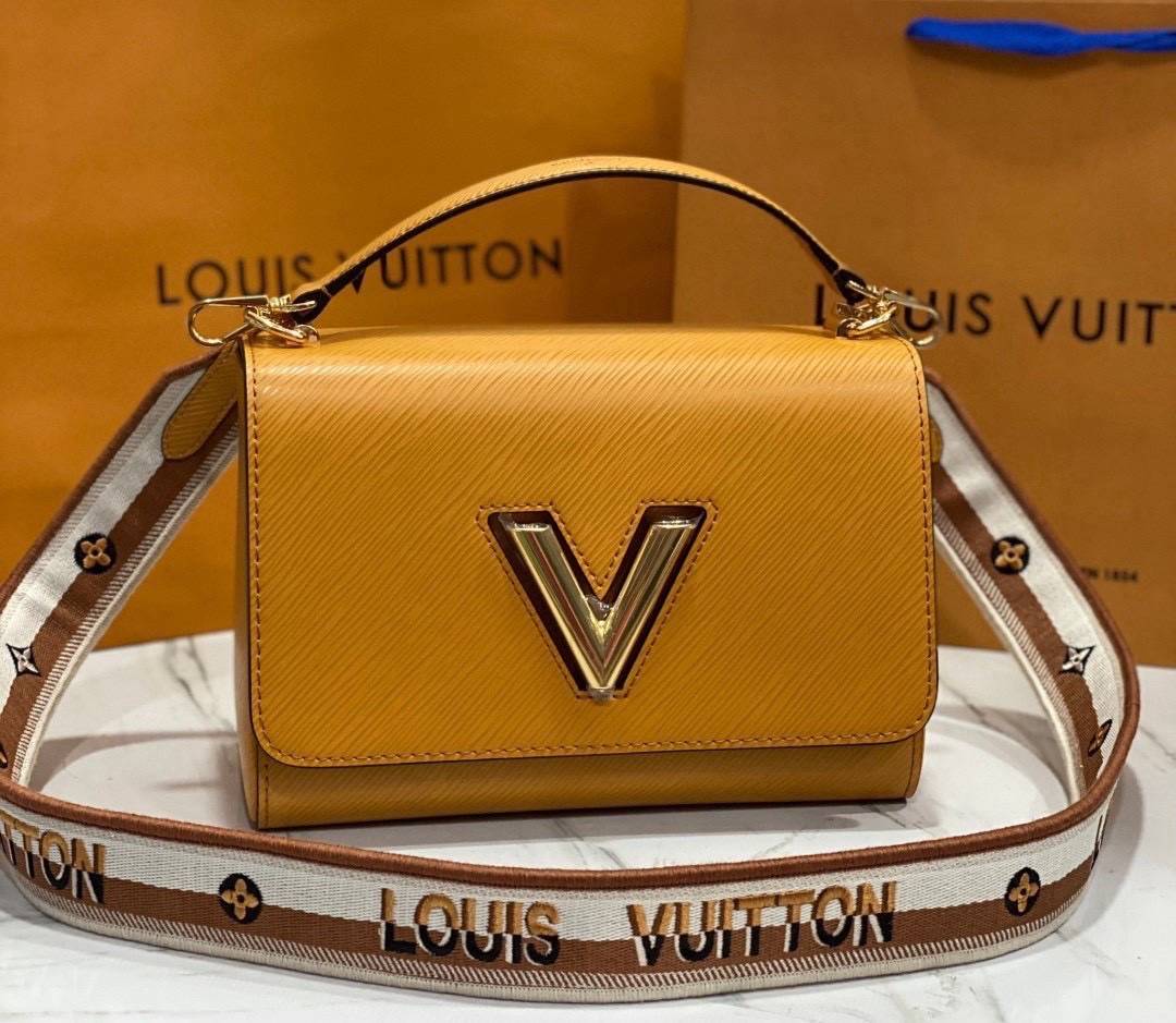 ORI หนังแท้ | LV Twist MM bag Epi grain leather กระเป๋าสะพาย/กระเป๋าถือรุ่น พร้อมสายสปอร์ต หนังลายเกรน Epi โดดเด่นด้วยโลโก้หน้า สวยหรูเป็นเอกลักษณ์ ดีไซน์คัลเลอร์บล็อค สัมผัสโดดเด่นแมตช์กับทุกสไตล์