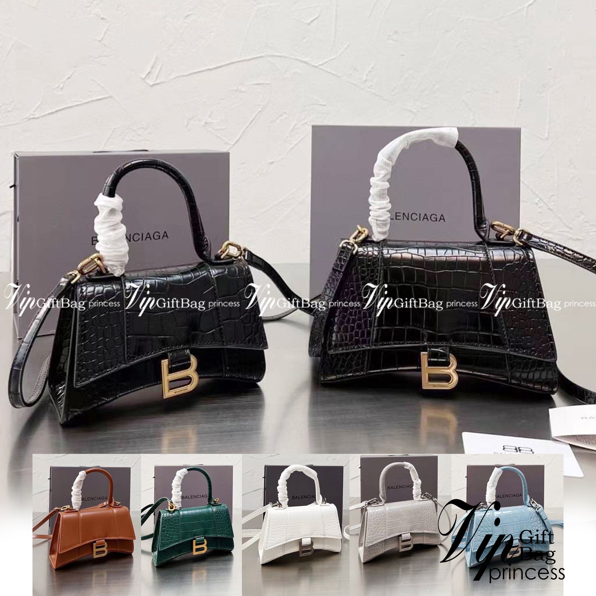 BALENCIAGA Hourglass BAG XS S / BALENCIAGA Hourglass Crocodile embossed calfskin กระเป๋าสะพายแบรนด์หรูซิกเนเจอร์ใบล่าสุด ที่มาพร้อมดีไซน์โดดเด่น มีความโฉบเฉี่ยว โค้งมนเหมือนพระจันทร์เสี้ยว เพิ่มความโดดเด่นสะดุดตาด้วยการตกแต่งอักษร B เมทัลลิก ที่เป็นเอกลัก